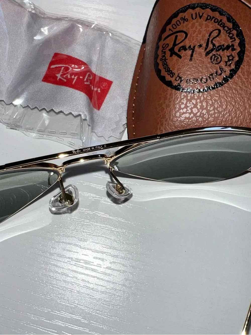 Ray-Ban Gold Frame Sunglasses with Blue Mirrored Lenses